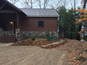 Driveway prep and install in front of nice cabin home