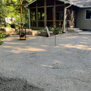 Base prep for flagstone patio in backyard of home near Traverse City