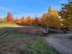 Open area with rolling landscape before excavation